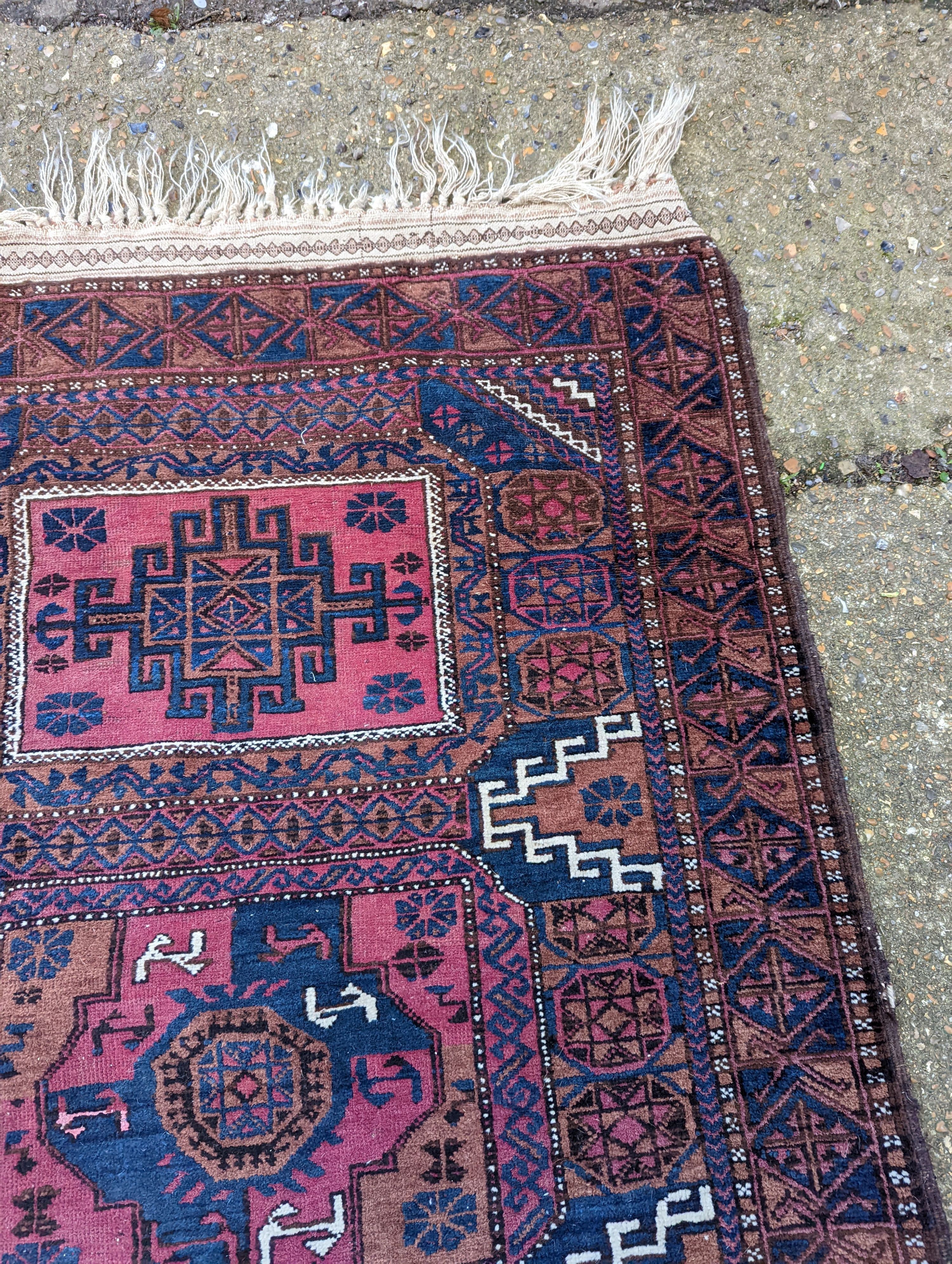 A Bokhara rug, 180 x 101cm